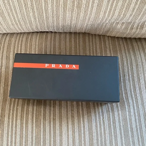 Prada sunglasses with the glasses bag and box